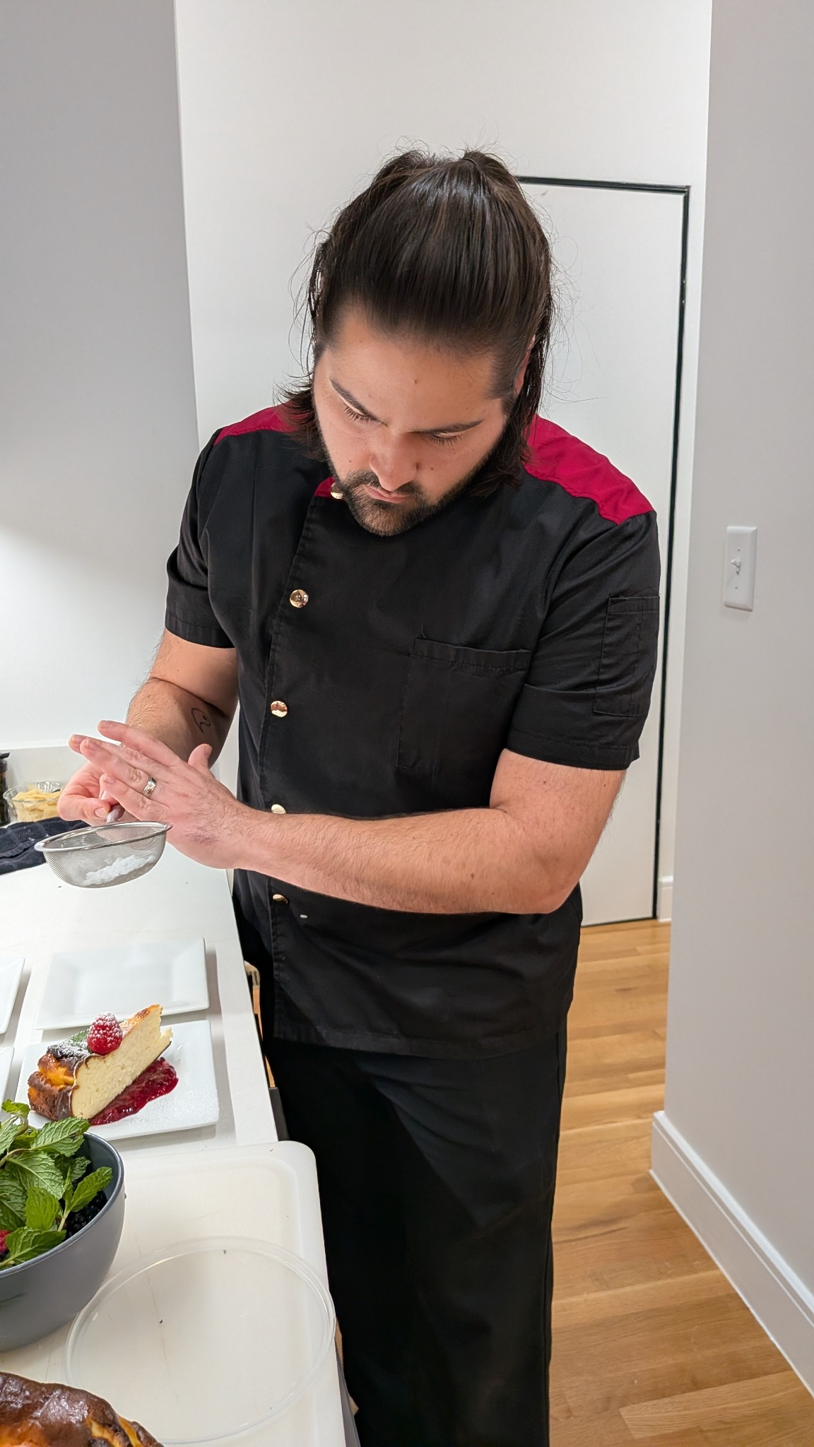 Chef Michael Brackett plating dessert